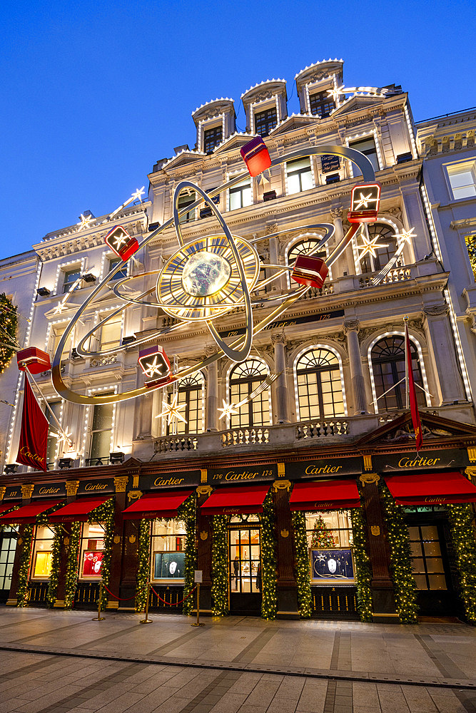 Cartier London New Bond Street Shop with Christmas Decorations at dusk, London, England, United Kingdom