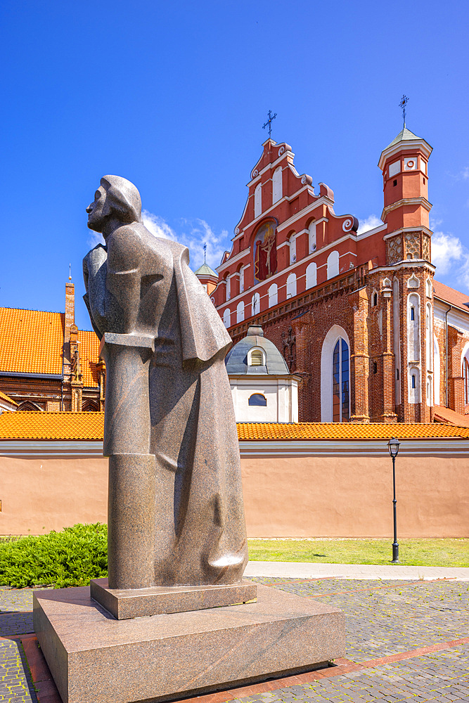 A Statue of the Polish Poet Adam Mickiewicz in front of St. Anne's Church and the Church of St. Francis and St. Bernard, Vilnius, Lithuania, Northern Europe
