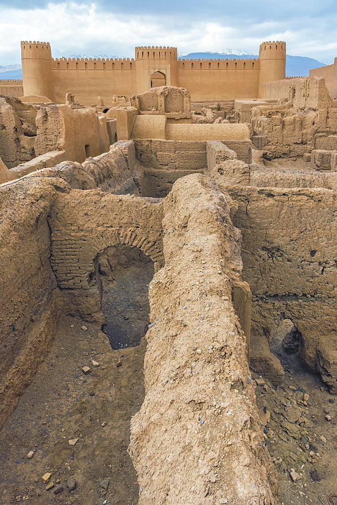 Ruins of towers and walls of Rayen Citadel, biggest adobe building in the world, Rayen, Kerman Province, Iran, Middle East