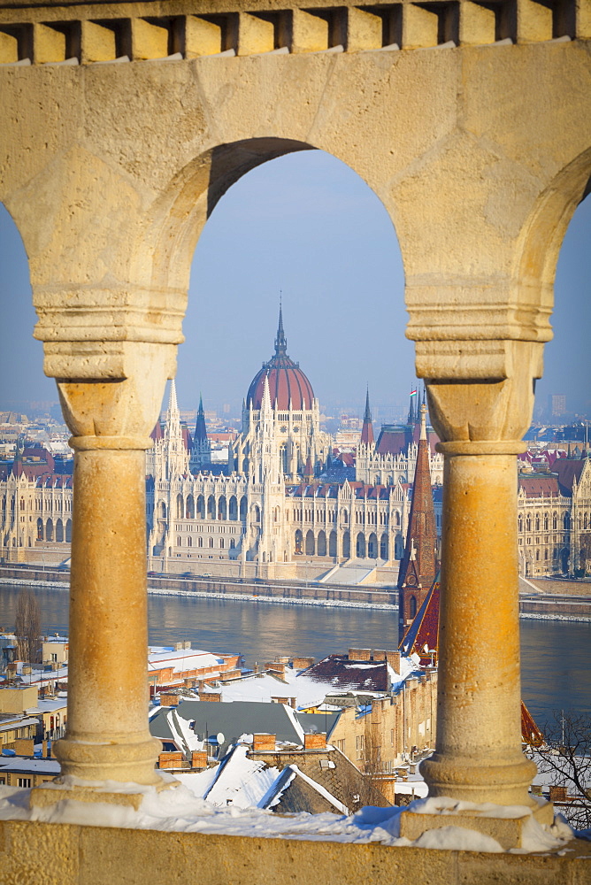 Hungarian Parliament illuminated by warm light on a winters afternoon, Budapest, Hungary, Europe