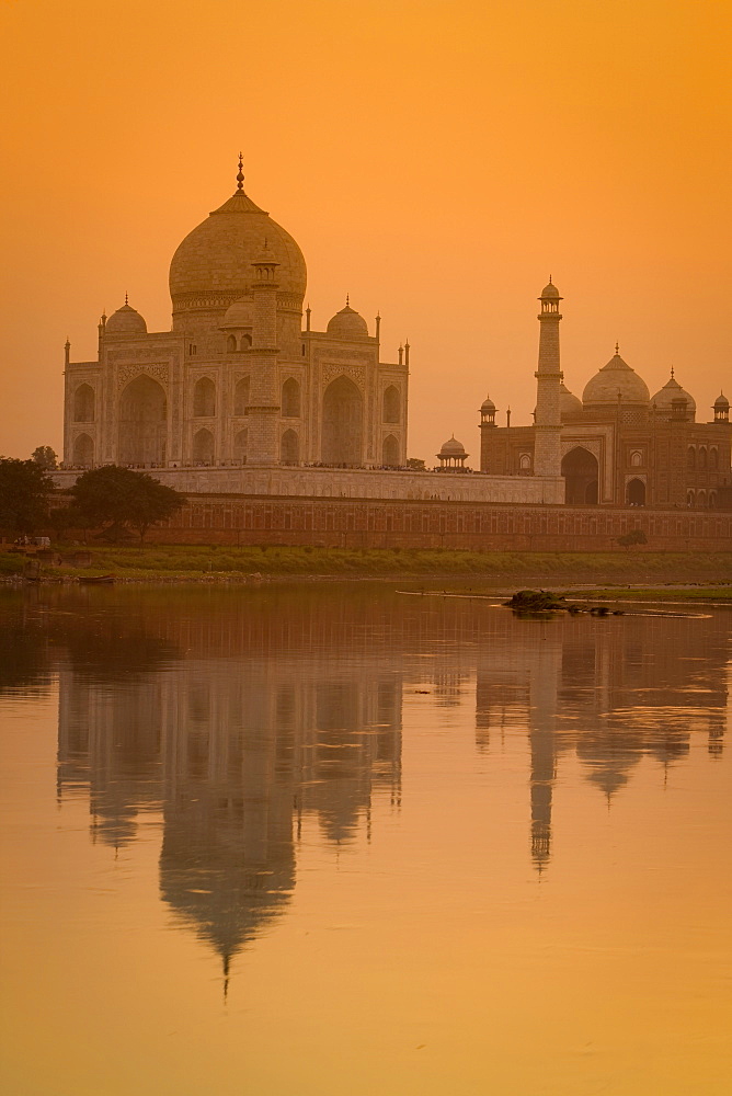 Taj Mahal reflected in the Yamuna River at sunset, UNESCO World Heritage Site, Agra, Uttar Pradesh, India, Asia 