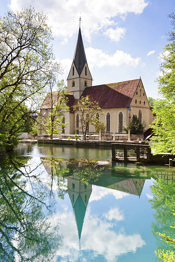 Church of Blaubeuren Monastry reflecting in Blautopf Spring, Blaubeuren, Swabian Alb, Baden Wurttemberg, Germany, Europe