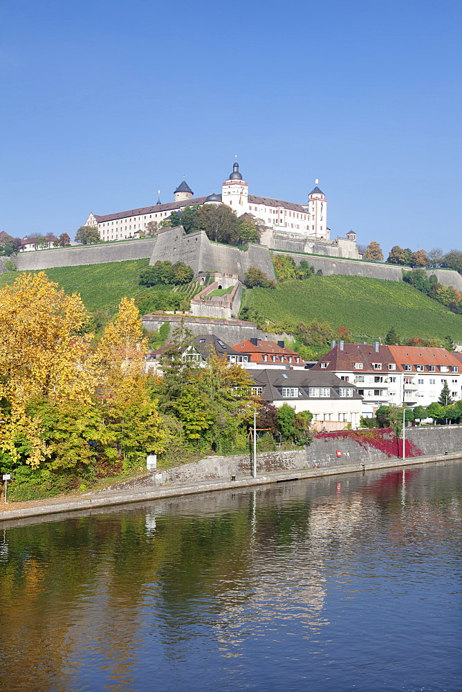 View over the Main River to Marienberg Fortress in autumn, Wuerzburg, Franconia, Bavaria, Germany, Europe