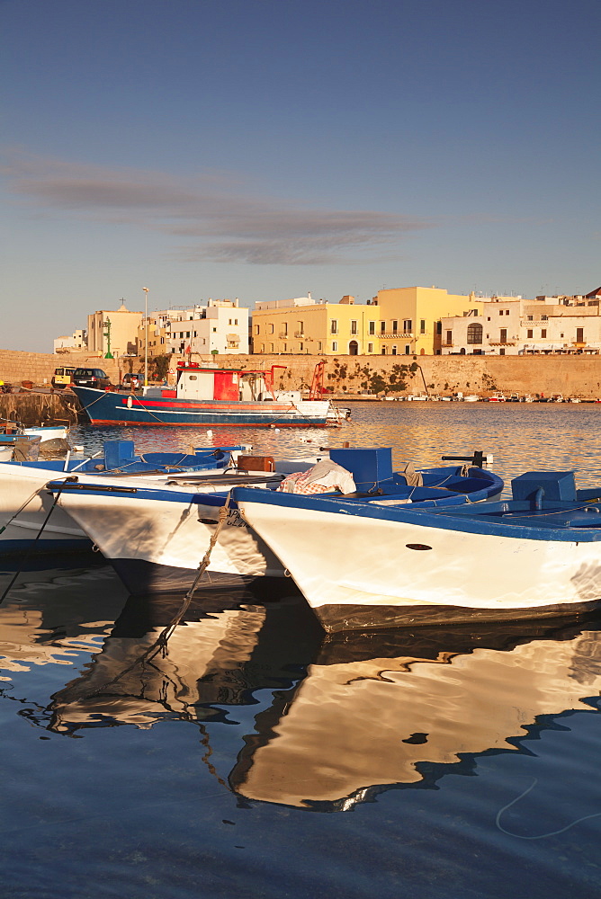 Fishing boats at the port, old town at sunrise, Gallipoli, Lecce province, Salentine Peninsula, Puglia, Italy, Europe