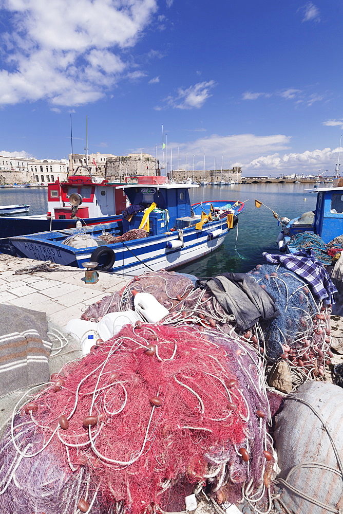 Fishing boats at the port, old town with castle, Gallipoli, Lecce province, Salentine Peninsula, Puglia, Italy, Europe