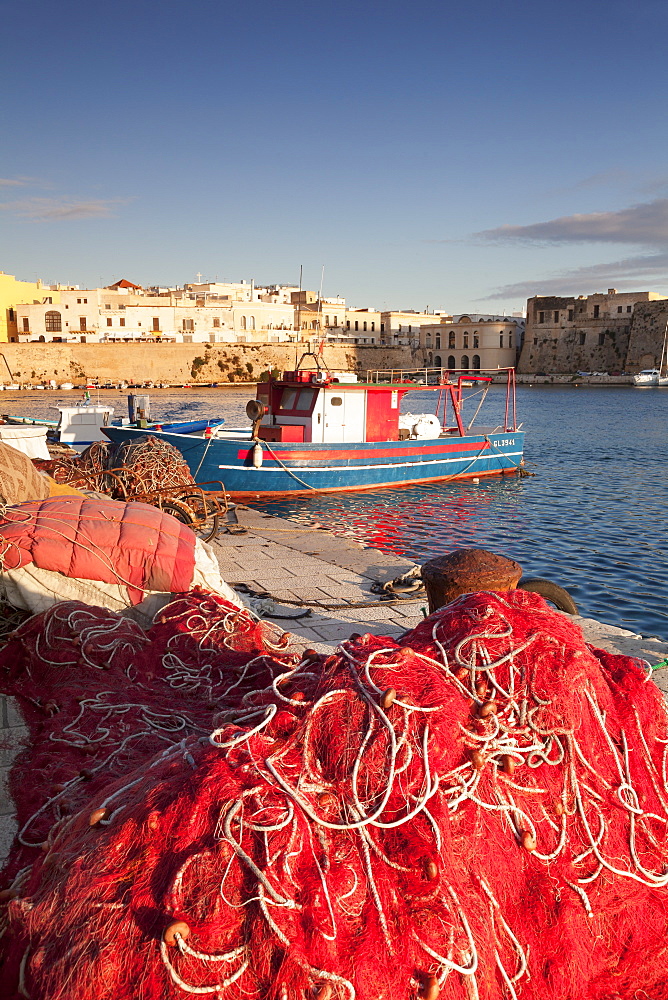 Fishing boats and fishing net at the port, old town, Gallipoli, Lecce province, Salentine Peninsula, Puglia, Italy, Mediterranean, Europe