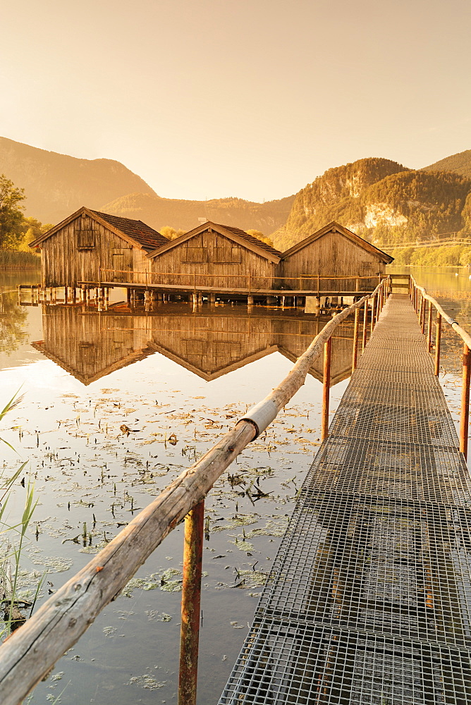 Boathouses at Kochelsee Lake at sunrise, Upper Bavaria, Bavaria, Germany, Europe