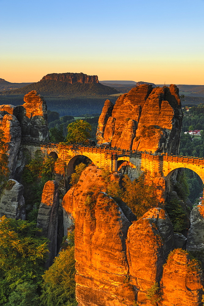 Bastei Bridge at sunrise, Lilienstein Mountain, Elbsandstein Mountains, Saxony, Germany, Europe