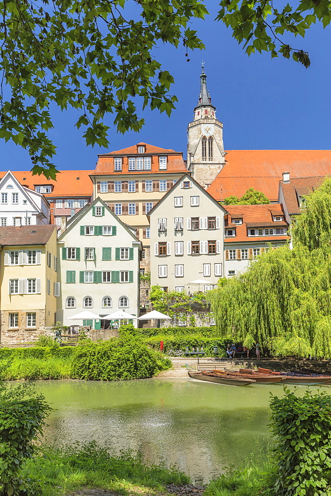 Old town with Stiftskirche church reflecting in Neckar river, Tubingen, Baden-Wurttemberg, Germany, Europe