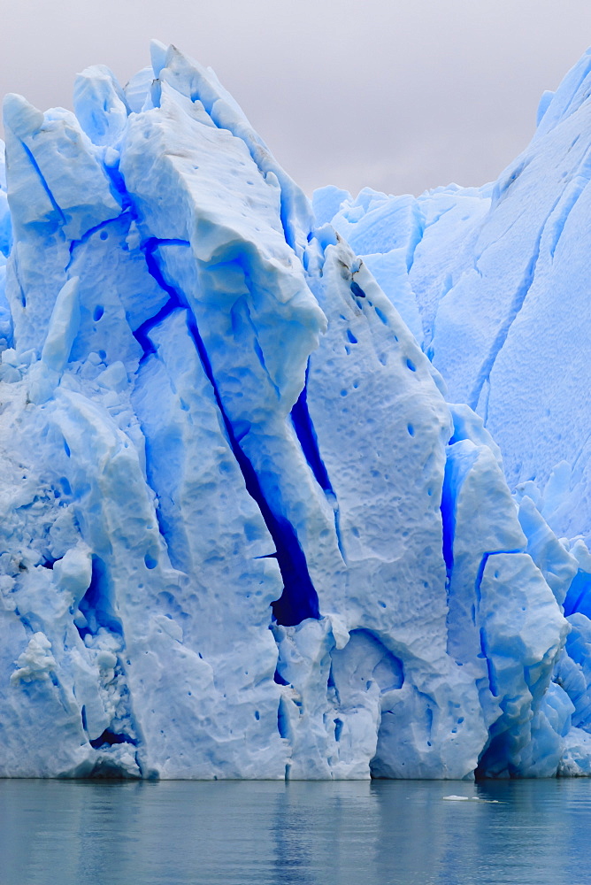 Lake-level view of blue ice at the glacier face, Grey Glacier, Torres del Paine National Park, Patagonia, Chile, South America