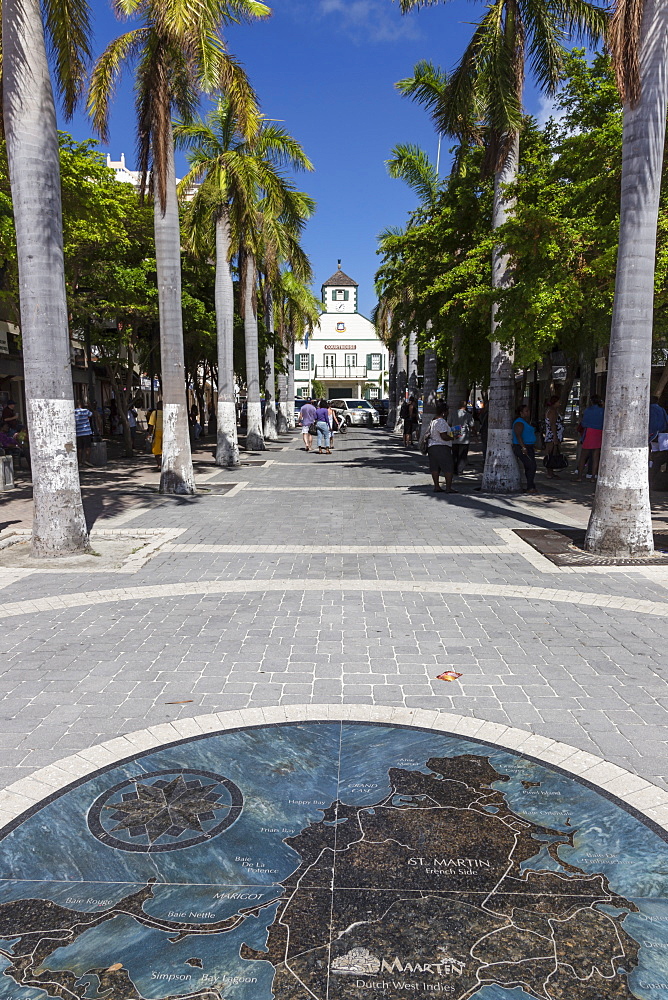 View along palm lined avenue to courthouse with pavement map of the island, Philipsburg, St. Maarten (St. Martin), West Indies, Caribbean, Central America