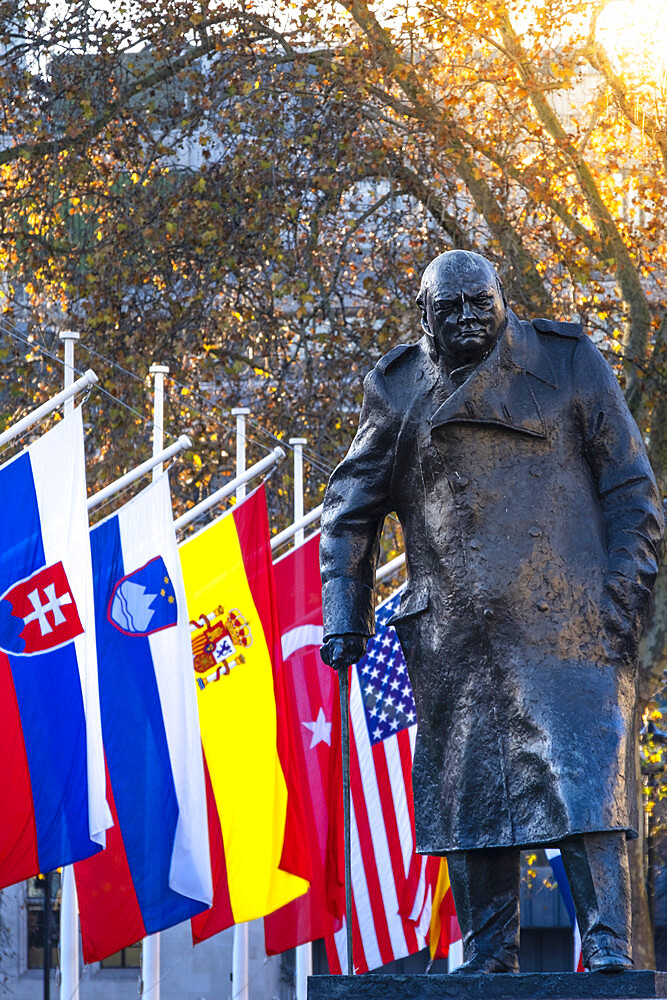 Parliament Square, Winston Churchill statue and NATO flags, Westminster, London, England, United Kingdom, Europe