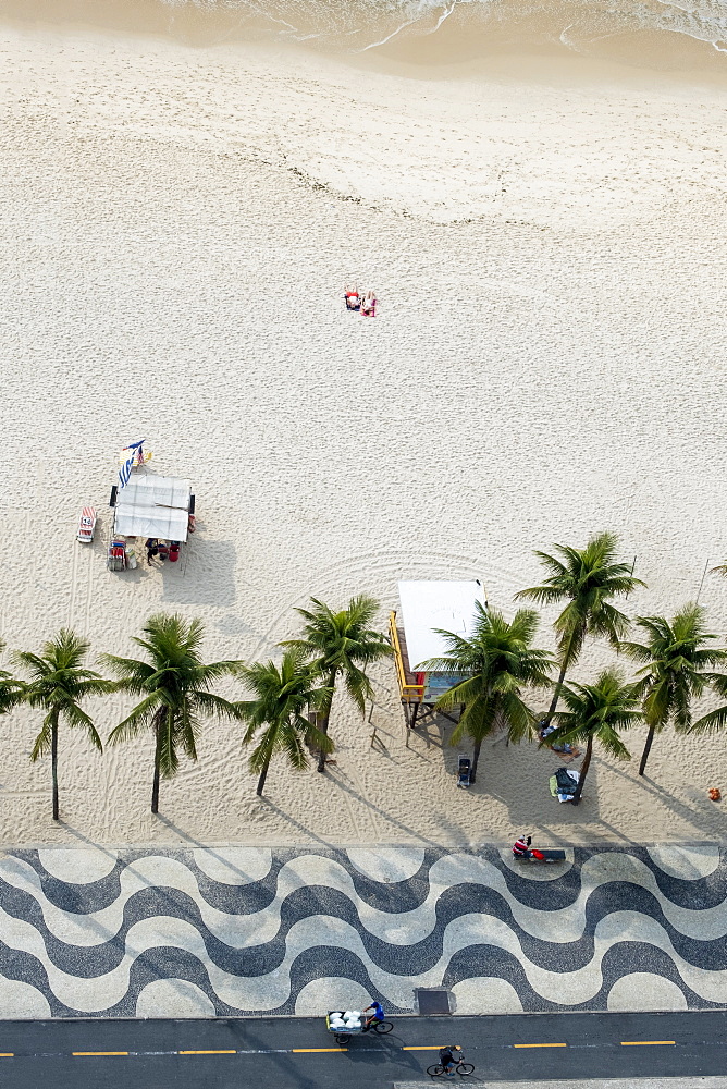 Elevated view of the beach with the famous wavy dragons tooth paving on Avenida Atlantica, Copacabana, Rio de Janeiro, Brazil, South America