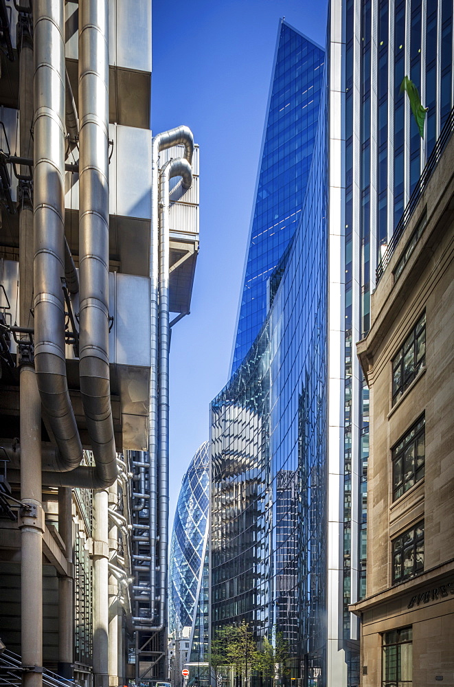 Lime Street in the financial district, with the Lloyds Building, the Scalpel, the Gherkin and St. Andrew Undershaft church, City of London, London, England, United Kingdom, Europe