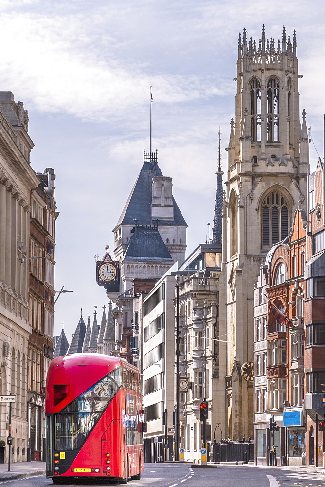 London bus on Fleet Street with St. Dunstan in the West church (Romanian church of Saint George) and the Royal Courts of Justice, London, England, United Kingdom, Europe