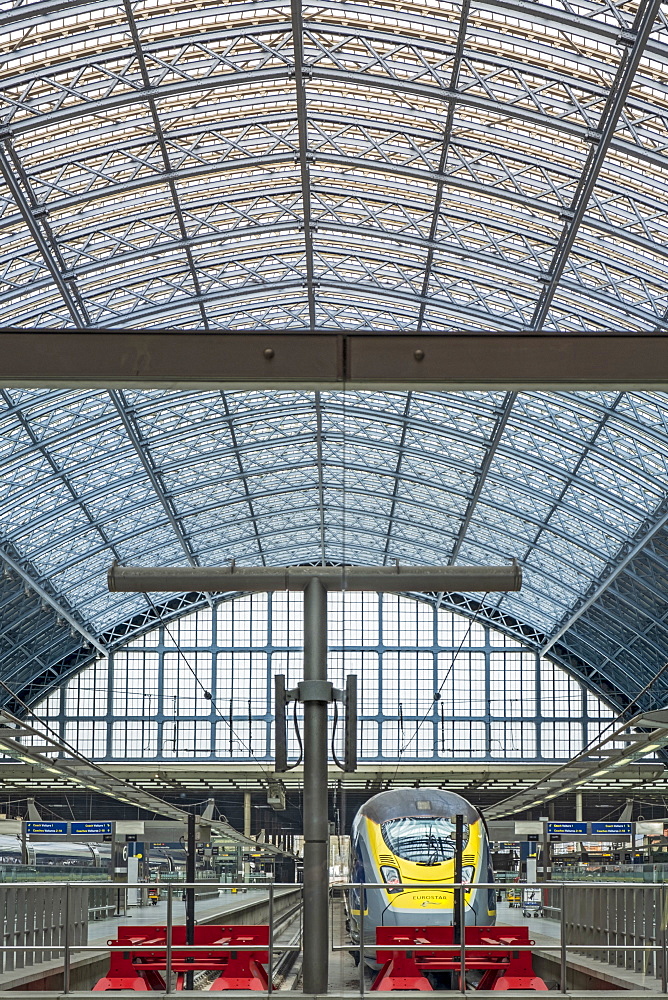 Interior of St. Pancras railway station, the Eurostar terminal, showing Victorian iron girders and Eurostar trains, London, England, United Kingdom, Europe