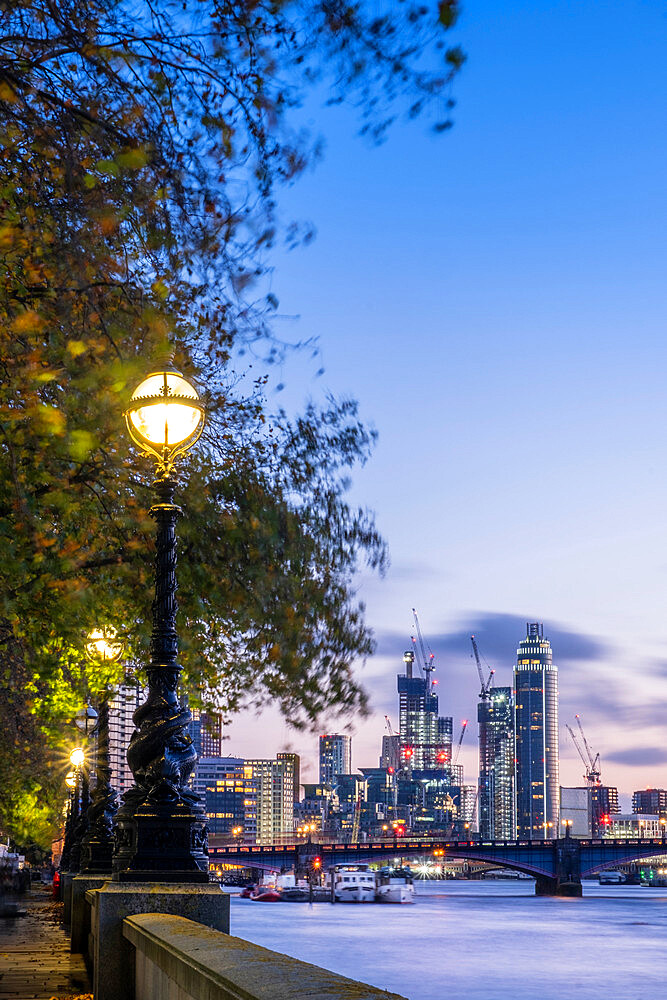 Victorian gaslamps in Westminster, Vauxhall Bridge, illuminated buildings in Nine Elms, London, England, United Kingdom, Europe