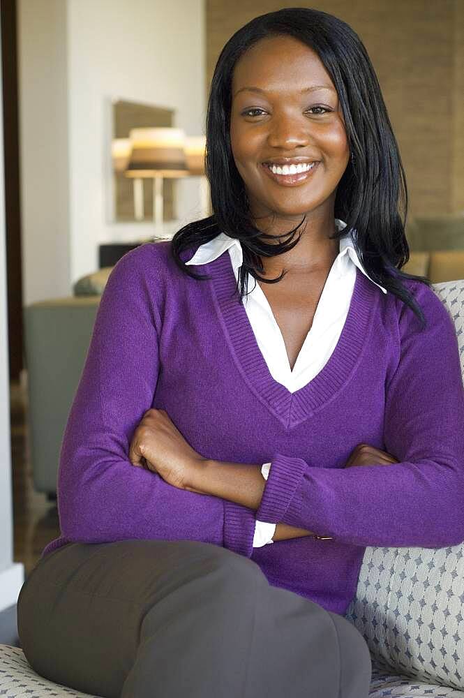 African woman with arms crossed