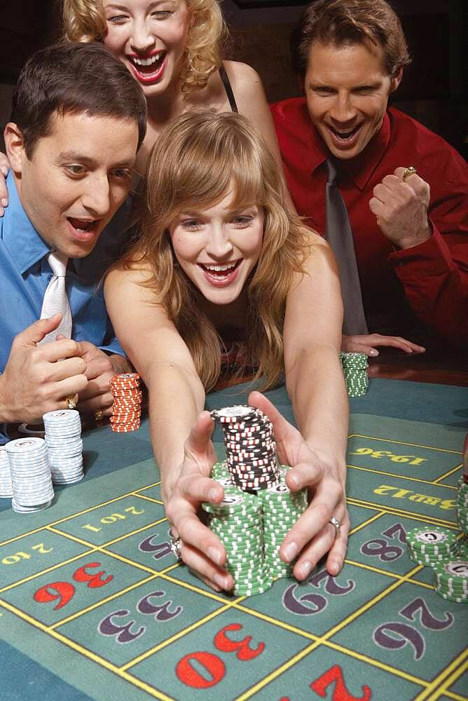 Woman successfully gambling in a casino