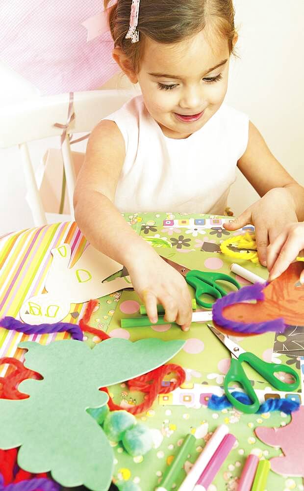 Young girl doing arts and crafts