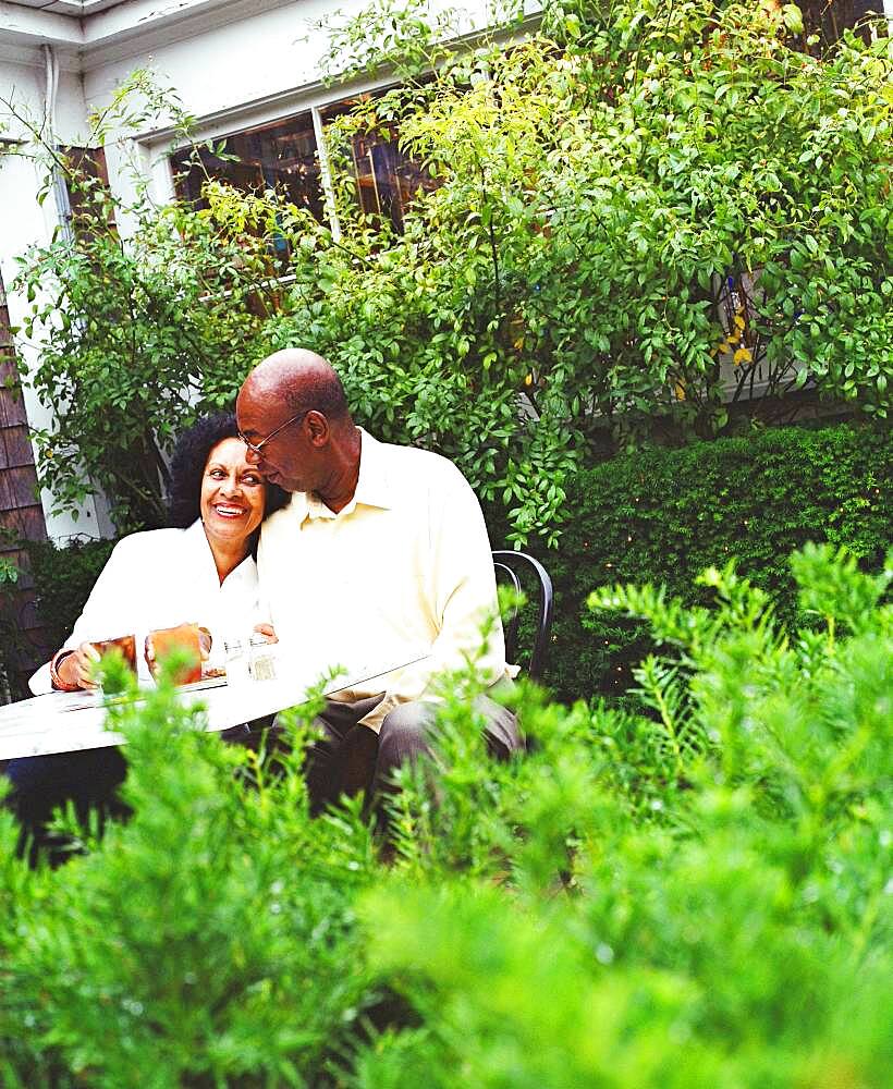 Senior couple relaxing with coffee