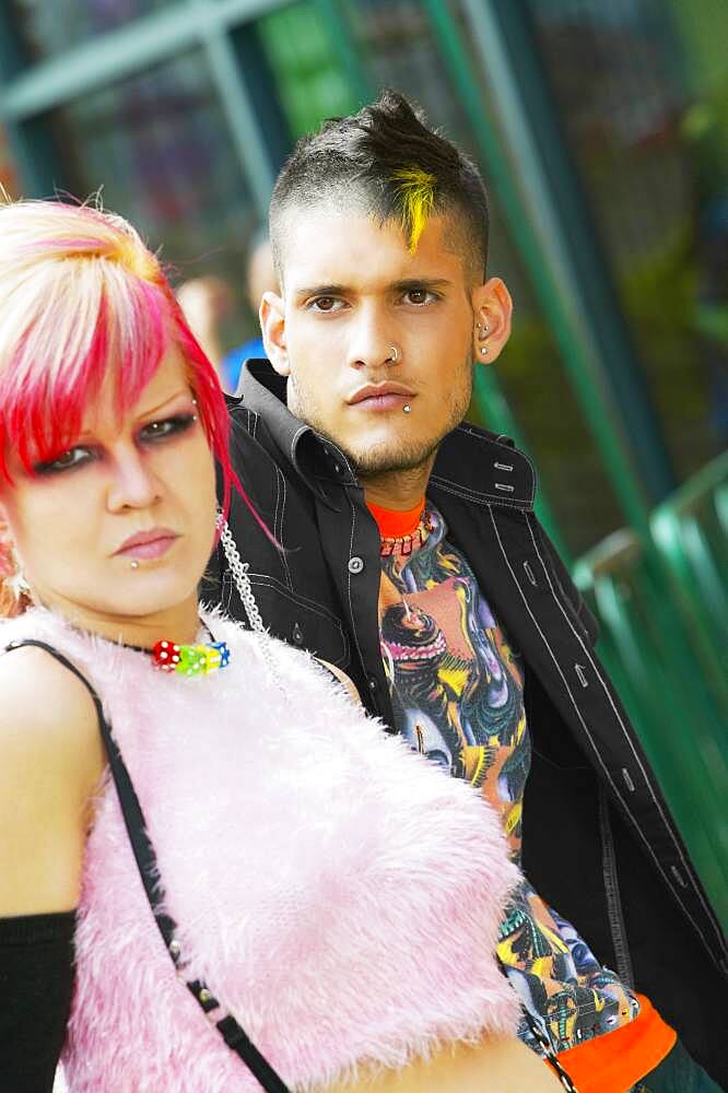 Close up of Hispanic punk couple outdoors