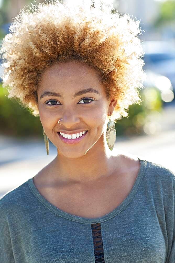 Close up of Black woman smiling outdoors