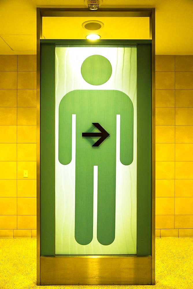 Green restroom sign for men