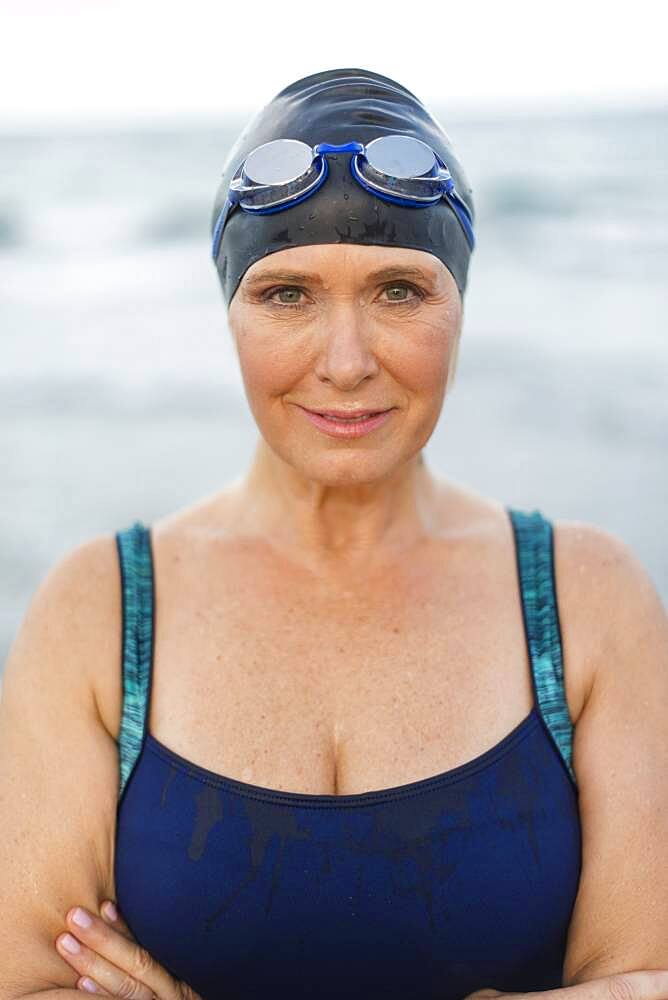 Caucasian swimmer on beach