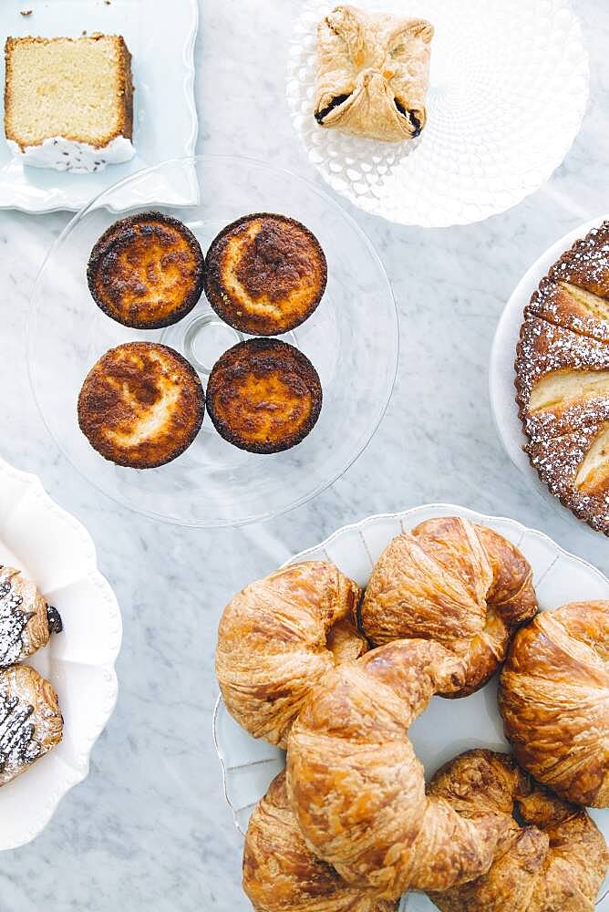 High angle view of variety of pastries on counter