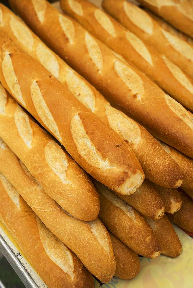 Close up of pile of baguettes