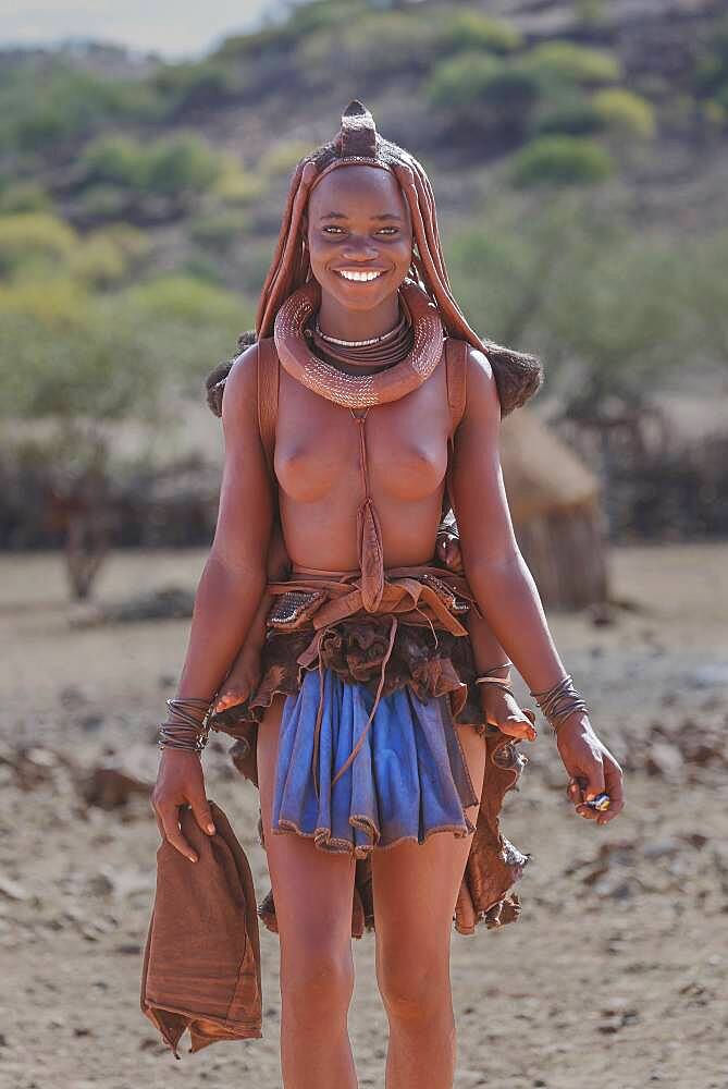 Black woman wearing traditional clothing and jewelry