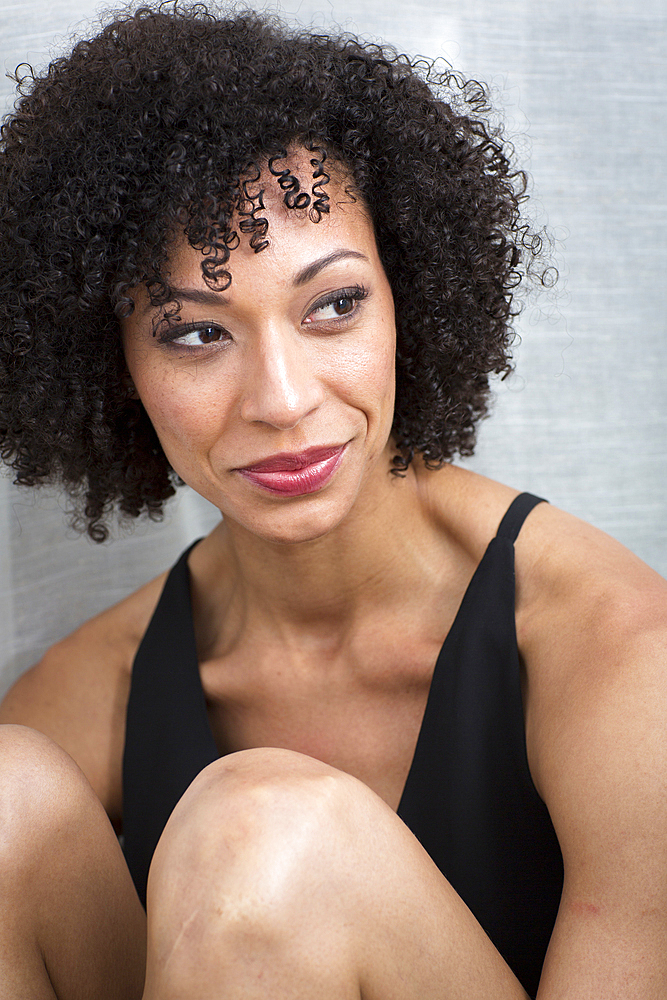 Close up of smiling Mixed Race woman