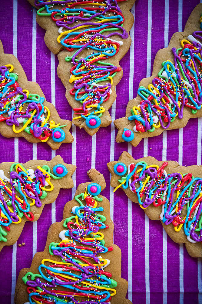 Festive Christmas tree cookies with multicolor icing