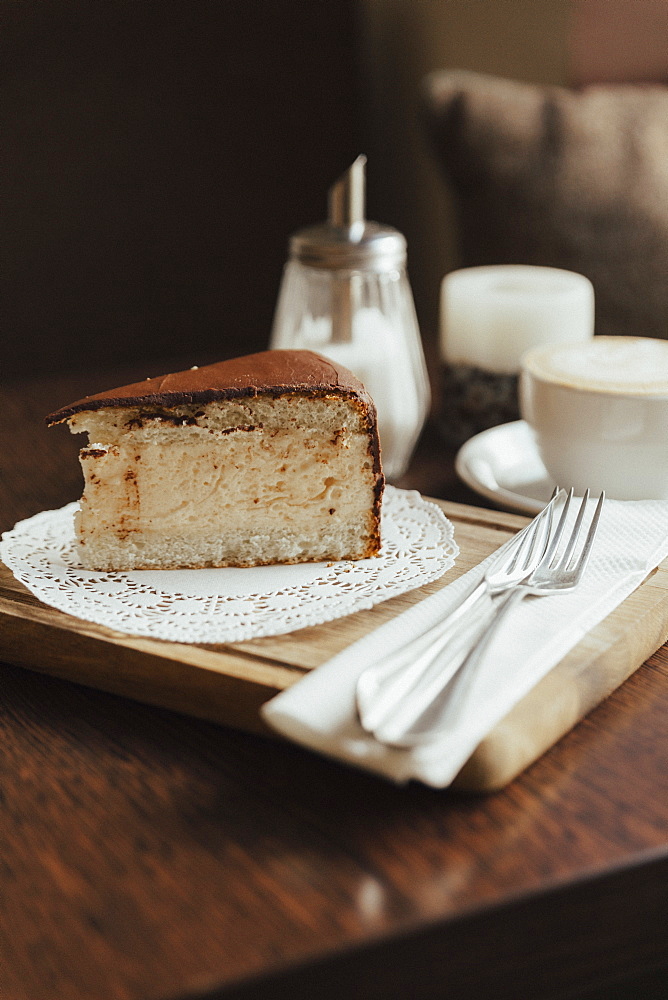 Slice of cake on doily