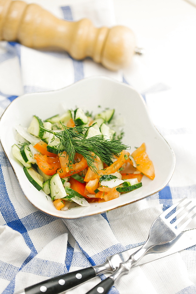 Garnish on salad in bowl