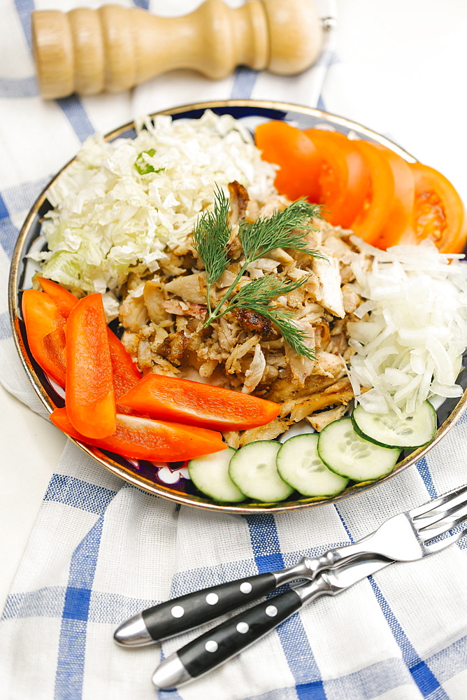 Garnish on meat and vegetable plate