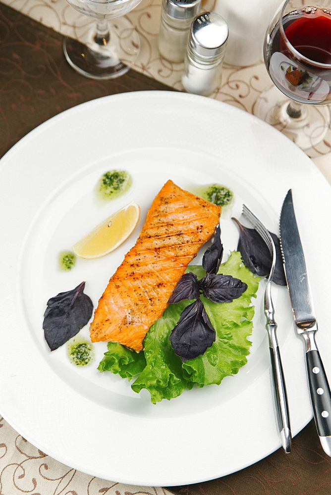 Grilled salmon on plate