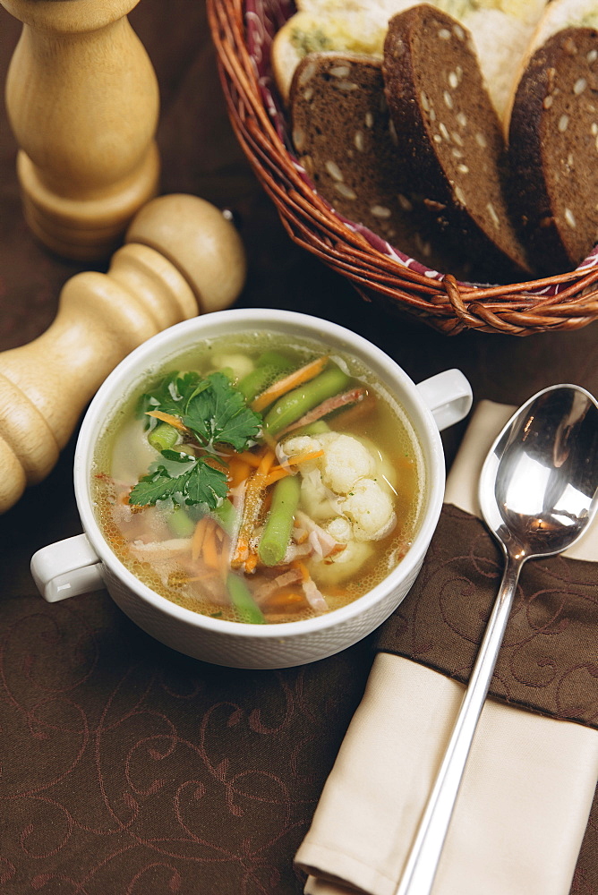 Cup of soup with bread