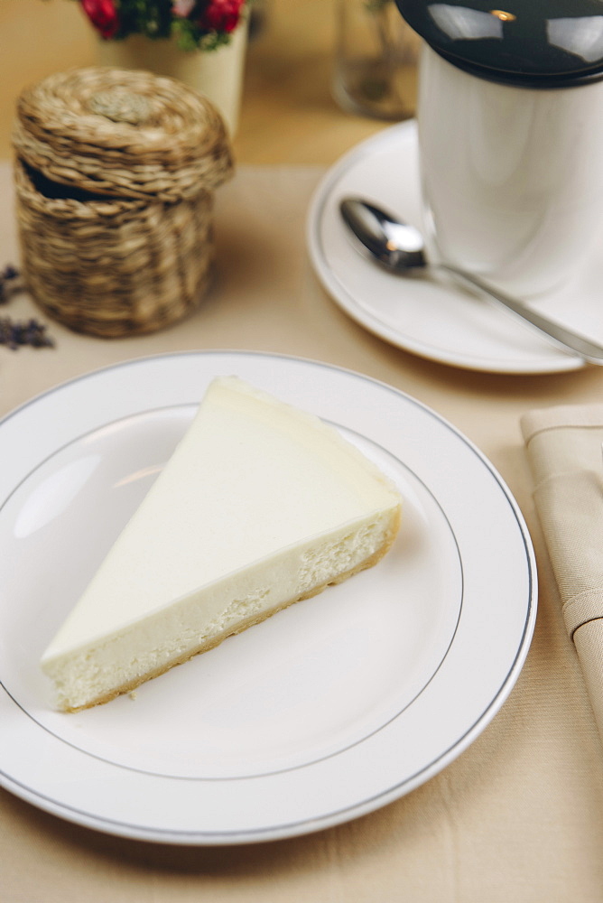 Slice of cheesecake on plate