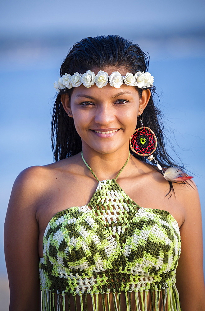 Mixed Race woman with wet hair wearing flower headband