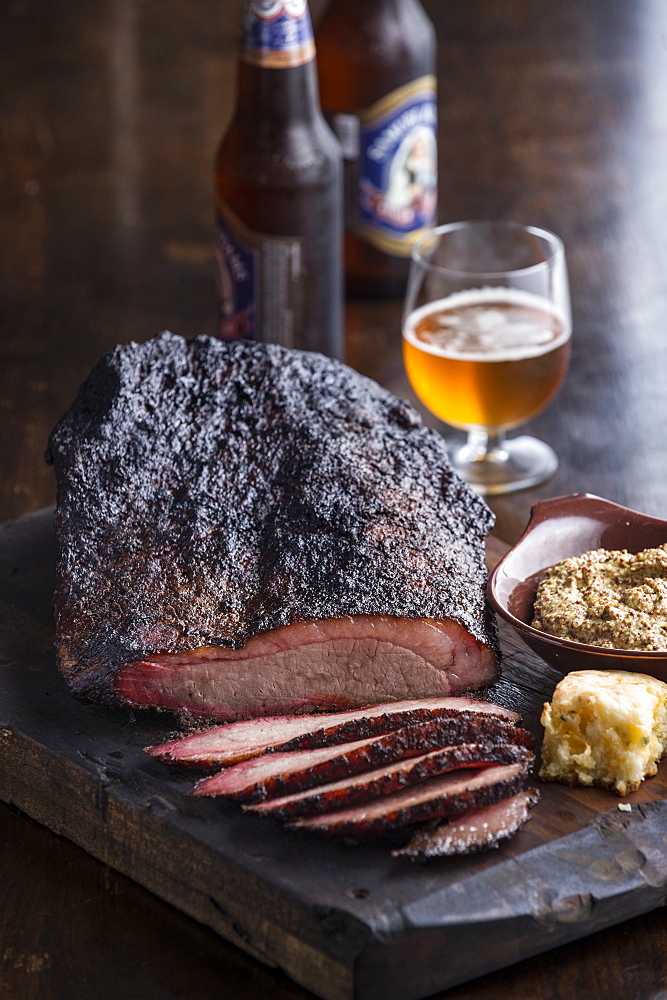 Sliced brisket on cutting board