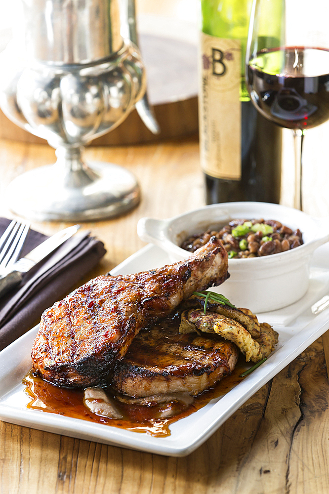 Pork chops and beans with red wine