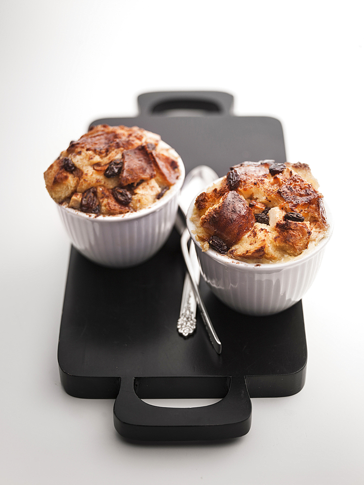 Cups of apple raisin bread pudding