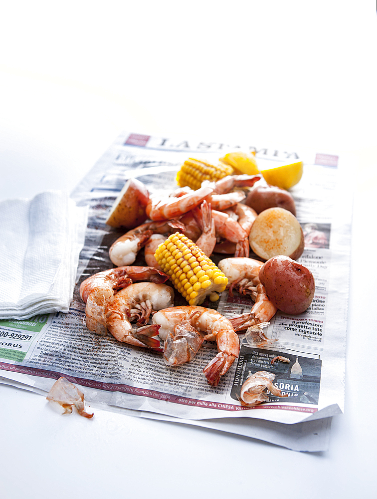 Seafood boil on newspaper