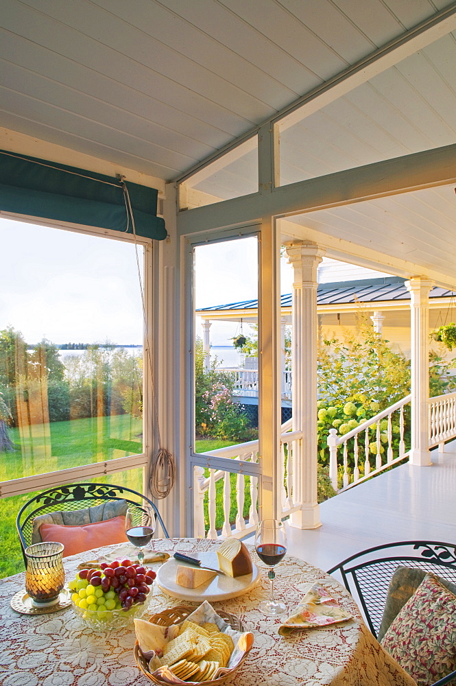 Breakfast set on front porch, Grand Isle, Vermont, USA