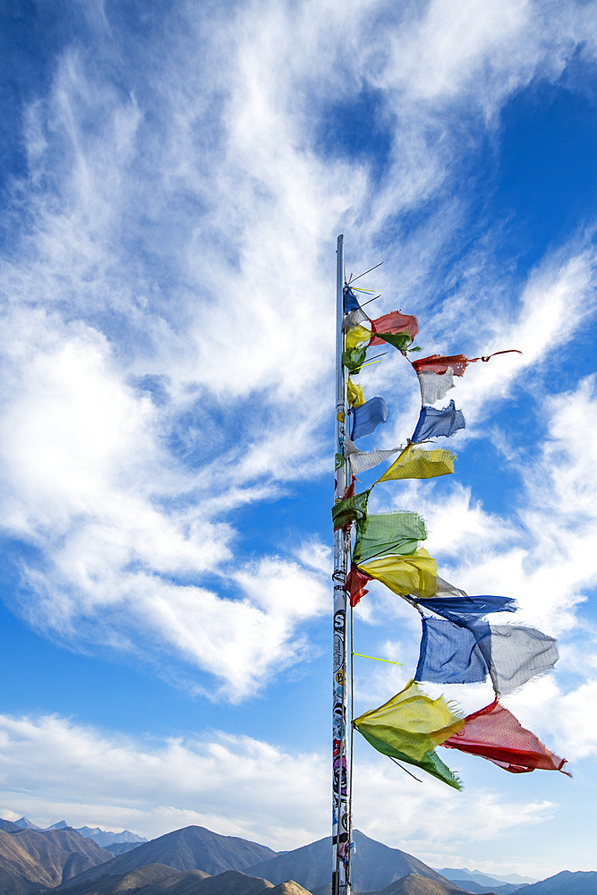 Prayer flags fluttering in wind atop Carbonate Mountain