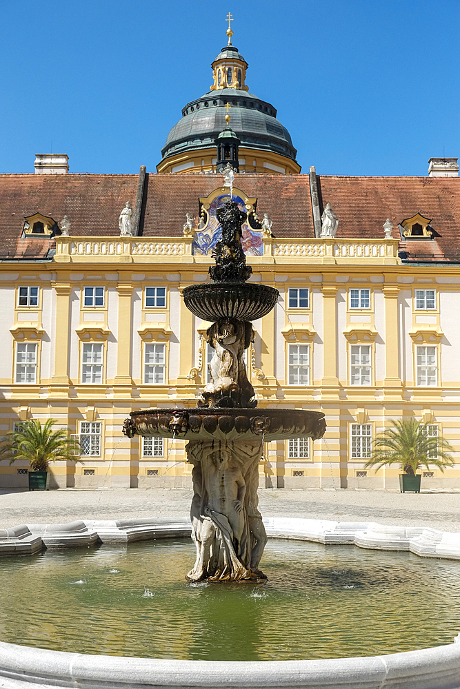 Fountain at Melk Abbey on sunny day, Melk, Austria