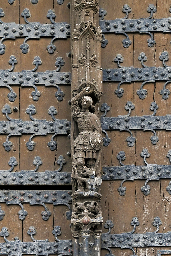 Wooden door with knight figurine at Brussels Town Hall, Brussels, Belgium