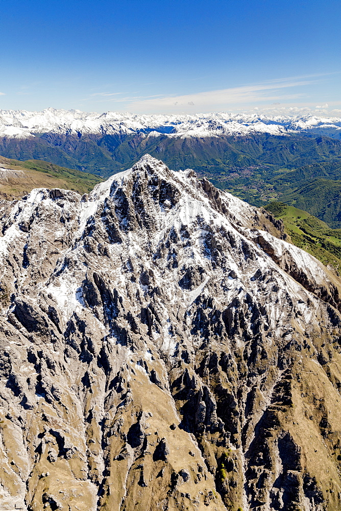 Aerial view of the snowy ridges of the Grignetta mountain in spring, Lecco Province, Lombardy, Italy, Europe